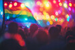 Unfocused image of silhouette of pride parade people and rainbow flag. LGBTQ pride.