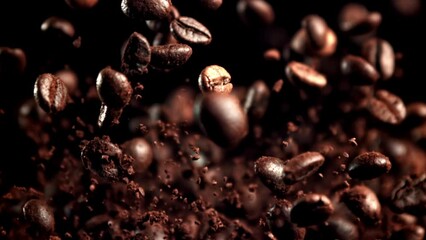 Canvas Print - Super slow motion roasted coffee beans . High quality FullHD footage