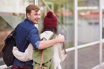 Poster - Students, couple and walking on campus for college, love and study with portrait or hug. Man, woman and strolling outdoor at school for university, relationship and education with face or backpack