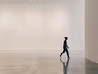 © Bambalino Studio - A man walks through a large, empty room. The room is bare and stark, with no furniture or decorations. The man's silhouette against the white walls creates a sense of emptiness and loneliness