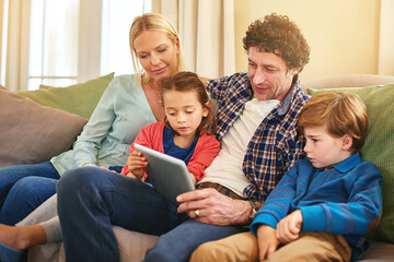 Poster - Family, tablet and together on couch for watching with happiness, internet connection and rapport. Parents, young children and tech on sofa in living room for streaming with relax, online and smile