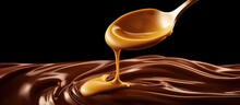 Liquid Trickling From Spoon Of Chocolate