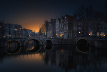 Twilight Serenity Over Amsterdam's Canals
