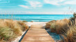 Wooden path on a sandy beach going to the sea