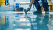 ©  Mohammad Xte - worker making Epoxy and waxed floor