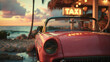 A vintage taxi parked near a beach at sunset
