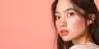 Banner with  young Asian woman on solid background, face with skin problems. Copy space, close-up. Acne, pimples, menstruation, acne treatment, hormonal failure, cosmetology.