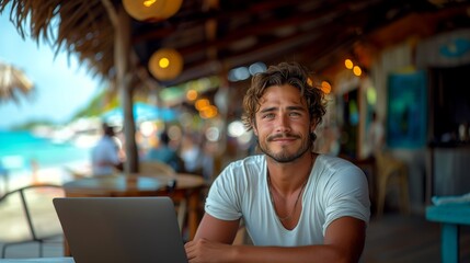 Young man with an opened laptop. He works as a freelancer near beach. Online teacher, student, investor or remote developer