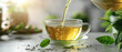 green tea is poured into a beautiful transparent cup close-up on a white background, with empty copy space