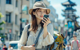 Fototapeta  - 
A young traveler capturing a moment on her smartphone, embodying modern exploration and connectivity.