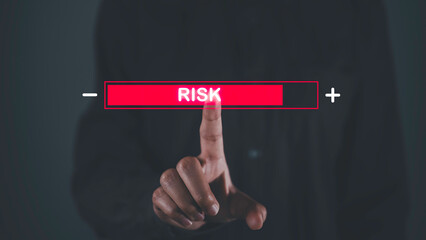 Businessman touch on indicator rating chance level to increase exposure for danger financial investment, Reduction strategy. Risk management control, High and low impact for business security.