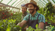 © Erzsbet - workers and farmers gardening in the polytune plastic greenhouse