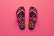 leopard beach slippers on pink background, vacation, summer