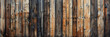 Wooden wall featuring a multitude of individual plank boards tightly aligned in a close-up view