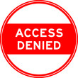 Red color round seal sticker in word access denied on white background