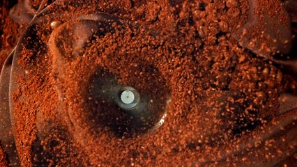 Poster - Super slow motion Coffee beans in a working grinder. High quality FullHD footage