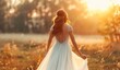 Elegant woman in a white dress enjoying a sunset in a tranquil field