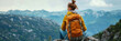 Panorama with a hiker in the beauty of the mountains