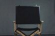 Director chair on grey background