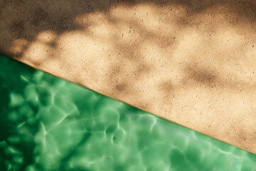 Canvas Print - Top view of travertine poolside in luxury hotel villa with sunlight shadow and swimming pool. Summer tropical background for product placement podium mockup.