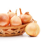 Fototapeta Psy - Big ripe onions in a basket.