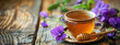 tea with violet and honey on the background of nature