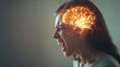 neurons of the brain in the head of an irritated aggressive person, a portrait of a  screaming young woman in profile.
