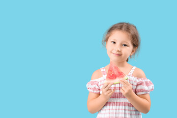 Canvas Print - Happy little girl with slice of fresh watermelon on blue background