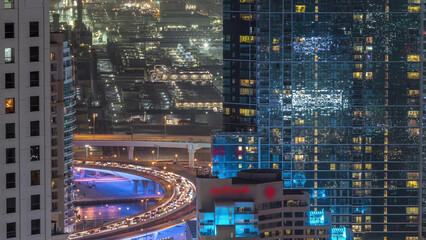 Wall Mural - Traffic on the bridge at JBR and Dubai marina aerial night timelapse.