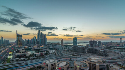 Wall Mural - Dubai Media City with Modern buildings aerial day to night timelapse, United Arab Emirates
