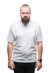 Sticker - Young caucasian hipster man wearing casual t-shirt over isolated background skeptic and nervous, frowning upset because of problem. Negative person.