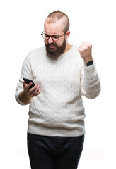 Poster - Young caucasian hipster man texting sending message using smartphone over isolated background annoyed and frustrated shouting with anger, crazy and yelling with raised hand, anger concept