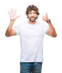 Sticker - Handsome hispanic model man over isolated background showing and pointing up with fingers number six while smiling confident and happy.