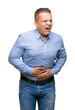 © Krakenimages.com - Middle age arab business man over isolated background with hand on stomach because indigestion, painful illness feeling unwell. Ache concept.