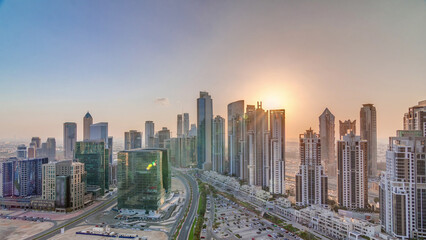 Wall Mural - Modern residential and office complex with many towers aerial timelapse at Business Bay, Dubai, UAE.