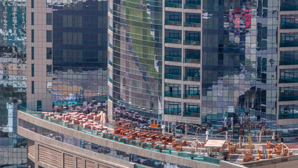 Wall Mural - Dubai's business bay towers at morning aerial timelapse.