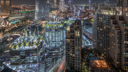 Poster - Amazing aerial view of Dubai downtown skyscrapers night timelapse, Dubai, United Arab Emirates