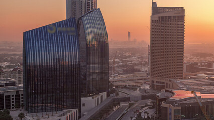 Poster - Dubai downtown street with busy traffic and skyscrapers around morning timelapse.