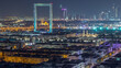 Dubai Frame with Zabeel Masjid mosque illuminated at night timelapse.