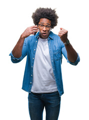 Wall Mural - Afro american man talking on the phone over isolated background annoyed and frustrated shouting with anger, crazy and yelling with raised hand, anger concept