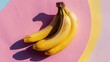 A bunch of bananas on a pink background. An exotic fruit. Delicious and juicy bright yellow bananas.