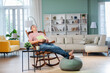 © StockImageFactory - sian Indian handsome man with grey hair enjoy reading book at home or taking a nap