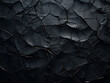 Versatile black texture with cracks suitable for backgrounds