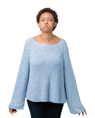 Sticker - Young beautiful african american woman wearing a sweater over isolated background puffing cheeks with funny face. Mouth inflated with air, crazy expression.