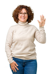 Poster - Beautiful middle ager senior woman wearing turtleneck sweater and glasses over isolated background showing and pointing up with fingers number five while smiling confident and happy.