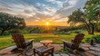 A backyard with a patio area captures the beauty of a sunset