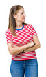 Middle age mature woman wearing casual t-shirt over isolated background smiling looking to the side with arms crossed convinced and confident