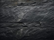 Slate background provides dark grey black texture