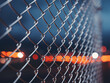 Perspective view of a fence with a metal grid in the background