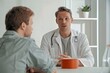 Male doctor and patient talking in clinic. Medicine and health care concept